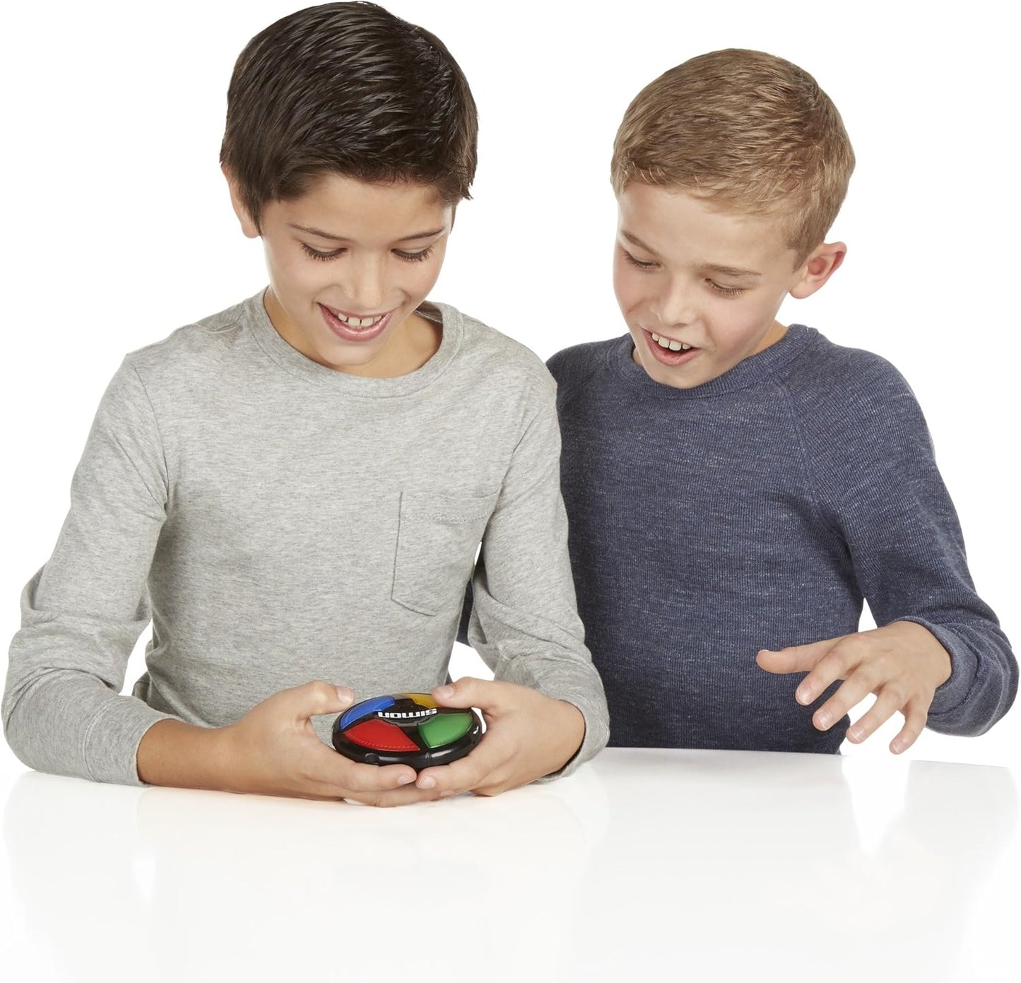 "Classic Memory Challenge Electronic Game | Compact & Portable | Fun for 1 or More Players | Ages 8+"